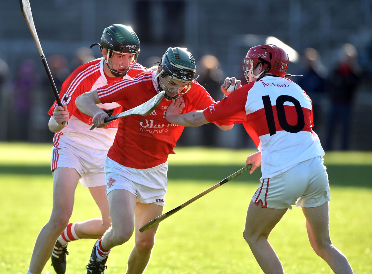 Blarney 's Mark Coleman is tackled by Charleville's Jacke Meade and James Kennedy during the Carrigaline Court Hotel Rebel Og central region Premier 2 MHC at Mallow in 2015. Picture: Eddie O'Hare Blarney 's Mark Coleman is tackled by Charleville's Jacke Meade and James Kennedy during the Carrigaline Court Hotel Rebel Og central region Premier 2 MHC at Mallow in 2015. Picture: Eddie O'Hare