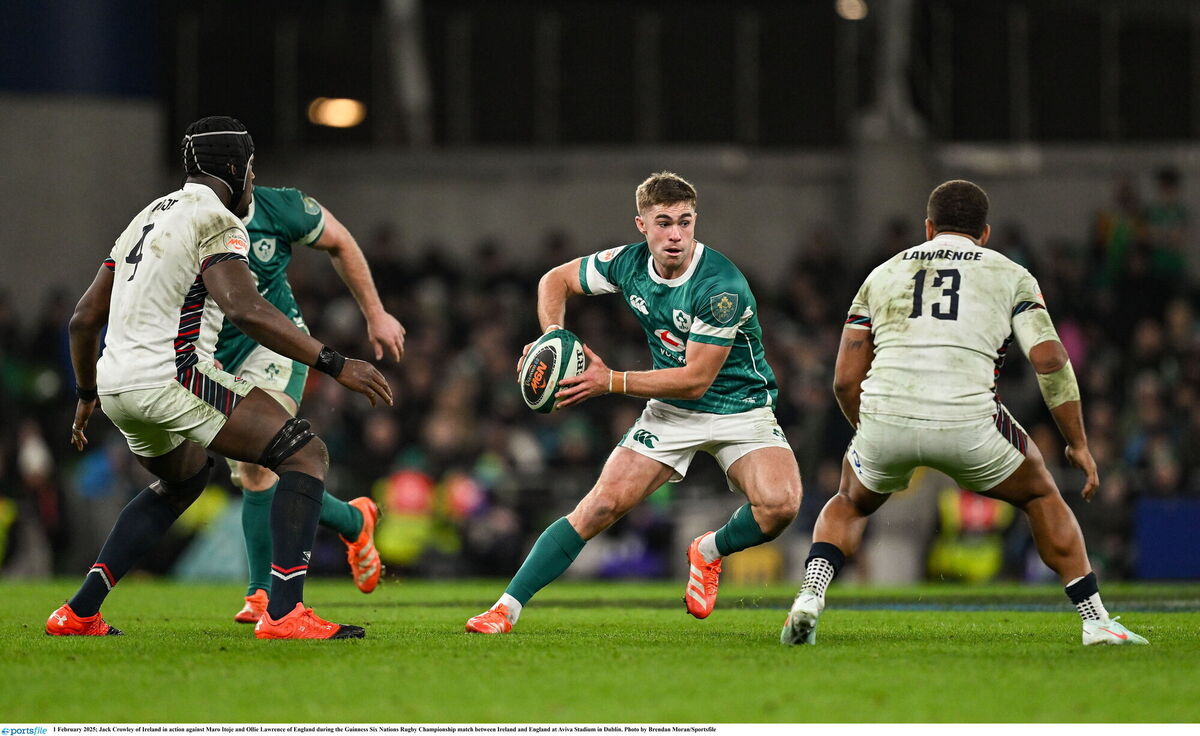 Jack Crowley of Ireland in action against Maro Itoje and Ollie Lawrence of England. Picture: Brendan Moran/Sportsfile Jack Crowley of Ireland in action against Maro Itoje and Ollie Lawrence of England. Picture: Brendan Moran/Sportsfile