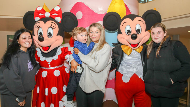 Kate McMahon, Kate O'Driscoll, Aaron Morrissey and Chloe O'Driscoll with Minnie and Mickey Mouse at the 20th anniversary celebrations of the Mahon Shopping Centre, Cork. - Picture: David Creedon