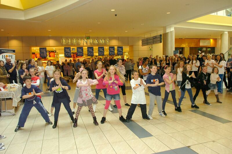 Young members of the Cork Arts Studio taking part in the flash mob in aid of the Hope Foundation in Mahon Point Shopping Centre. Picture: Richard Mills