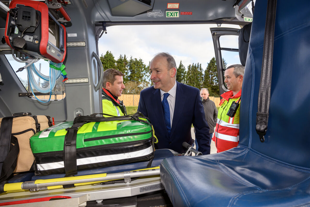 An Taoiseach Micheál Martin TD looking into the air ambulance helicopter after he launched the Cork University Hospital Helipad in Wilton, Cork. Picture Dan Linehan An Taoiseach Micheál Martin TD looking into the air ambulance helicopter after he launched the Cork University Hospital Helipad in Wilton, Cork. Picture Dan Linehan