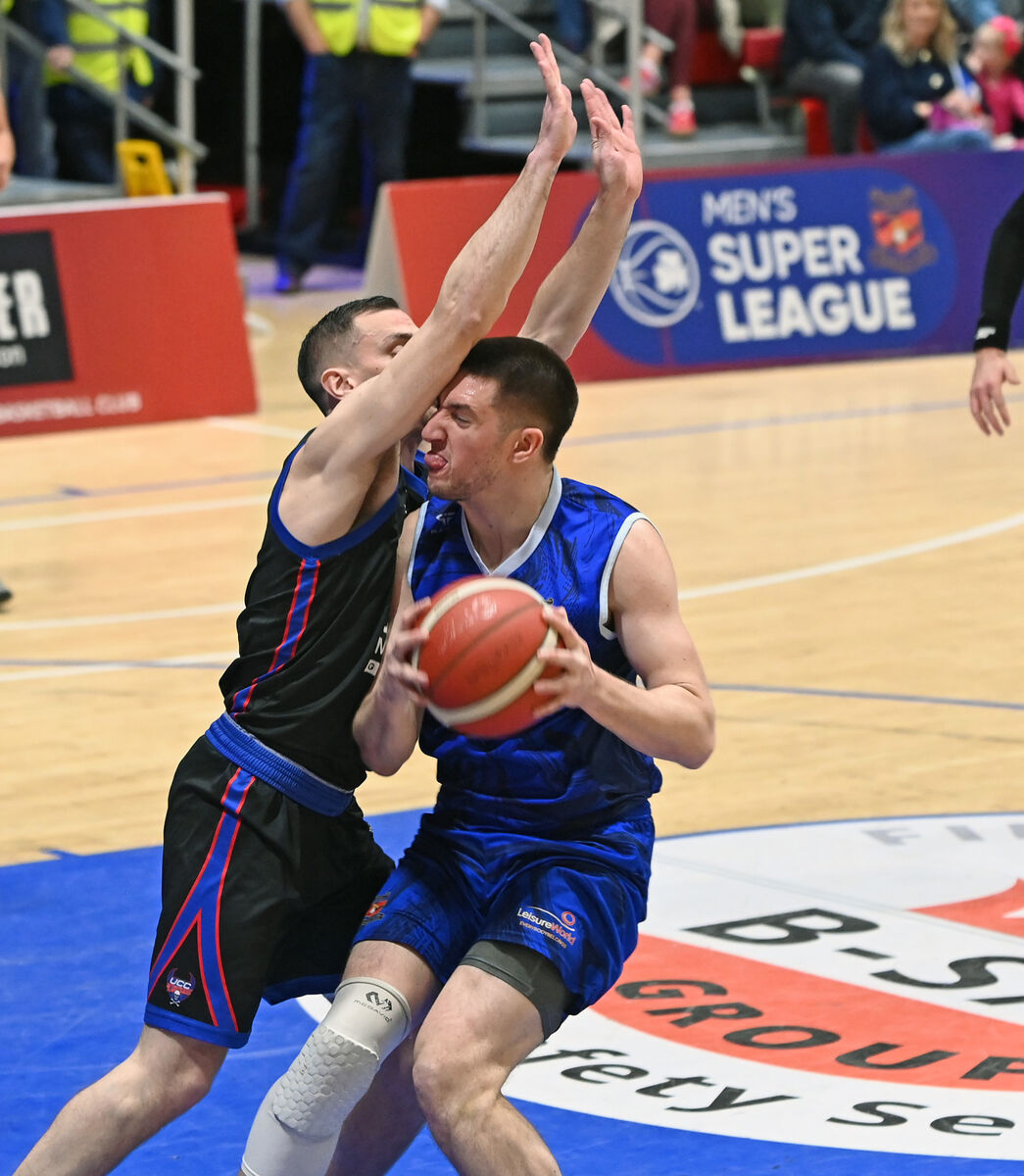 Energywise Ireland Neptune's Cian Heaphy under pressure from UCC Demons' Kyle Hosford. Picture: Eddie O'Hare Energywise Ireland Neptune's Cian Heaphy under pressure from UCC Demons' Kyle Hosford. Picture: Eddie O'Hare