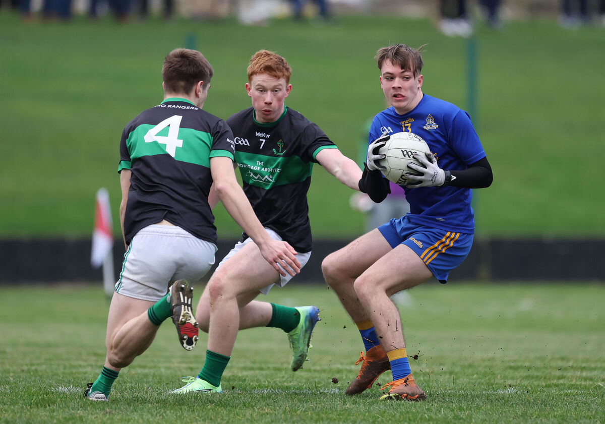 Sean Kirby St Finbarr's, takes on Dave Coughlan and Tim O'Brien, Nemo Rangers. Picture: Jim Coughlan. Sean Kirby St Finbarr's, takes on Dave Coughlan and Tim O'Brien, Nemo Rangers. Picture: Jim Coughlan.