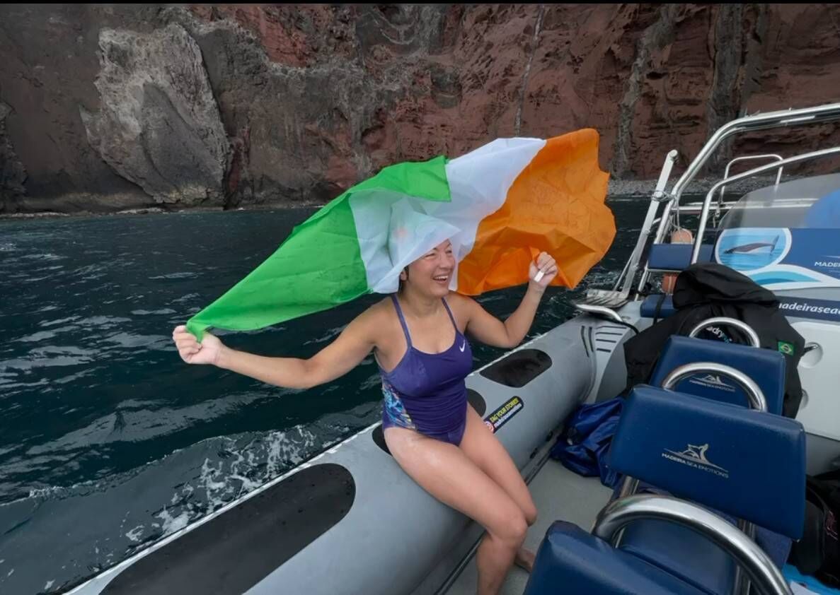 Olga O'Sullivan celebrates after finishing the Madeira to Desertas swim.