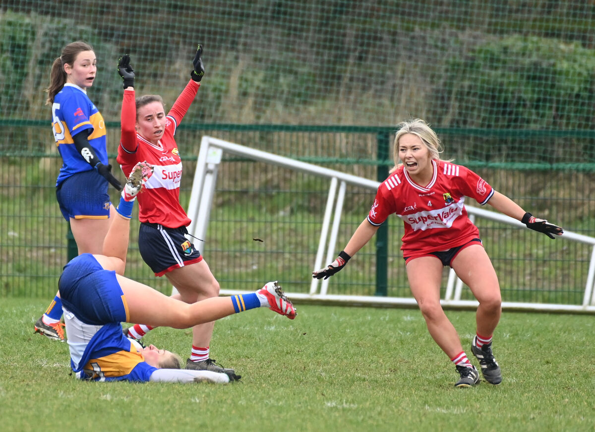 Tipperary's Emma Morrissey ends up on the ground near Cork's Siobhan Callanan and Melissa Duggan. Picture: Eddie O'Hare Tipperary's Emma Morrissey ends up on the ground near Cork's Siobhan Callanan and Melissa Duggan. Picture: Eddie O'Hare