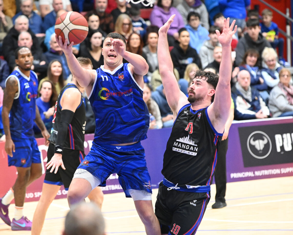 Energywise Ireland Neptune's Conor O'Sullivan lays up a basket from UCC Demons' David Lehane during the Men's Super League at a packed Neptune stadium. Picture: Eddie O'Hare