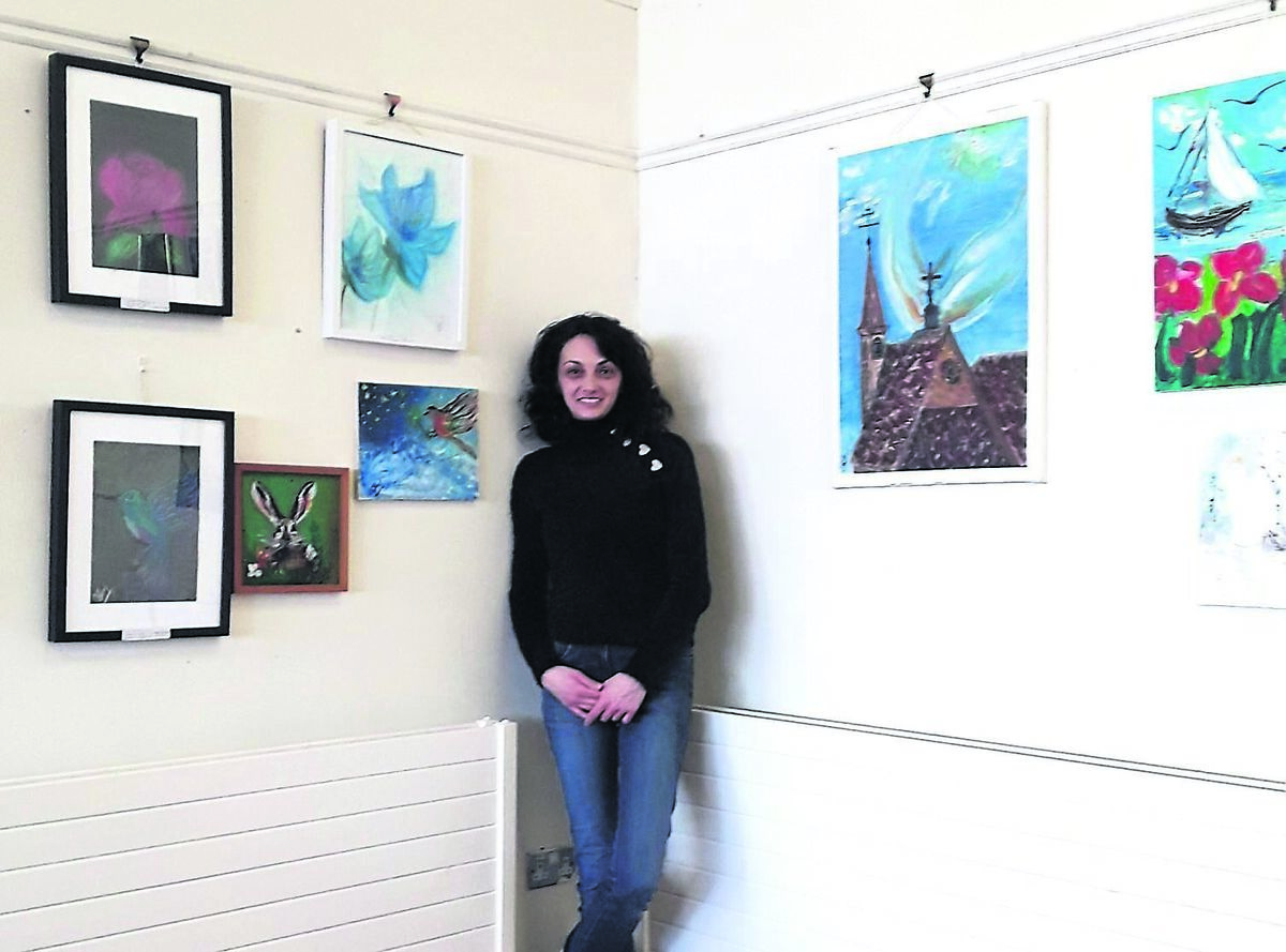 Snejana Angelova with her exhibition Vivid Dreams in Mayfield Library.