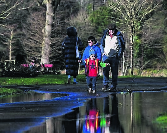 Dominic Scally, with his grandsons, Luke and Peter Deasy, from Ballincollig enjoying the fine weather that accompanied the arrival of spring at Fitzgerald Park.
