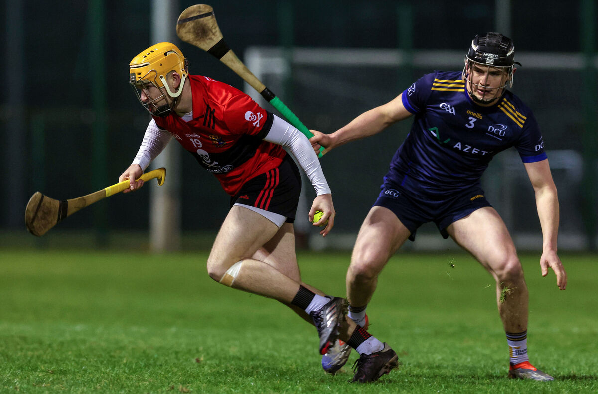 Darragh Flynn of UCC tries to get away from DCU's Paddy Langton. Picture: Inpho/Lorraine O'Sullivan Darragh Flynn of UCC tries to get away from DCU's Paddy Langton. Picture: Inpho/Lorraine O'Sullivan