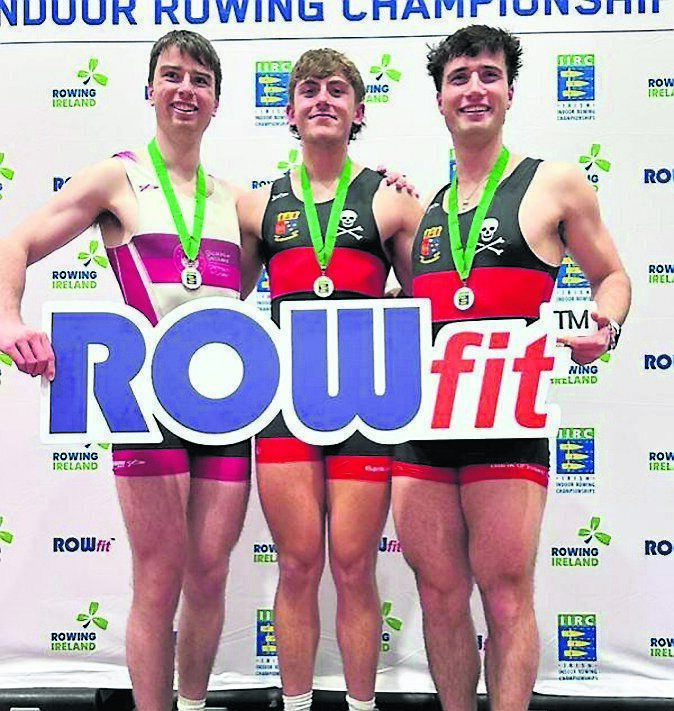 Gold medal winner Adam Murphy (UCC) on the Podium at the Irish Indoor Rowing Championships, with Andrew Sheehan (UCC) and Brian Colsh (UG). Gold medal winner Adam Murphy (UCC) on the Podium at the Irish Indoor Rowing Championships, with Andrew Sheehan (UCC) and Brian Colsh (UG).