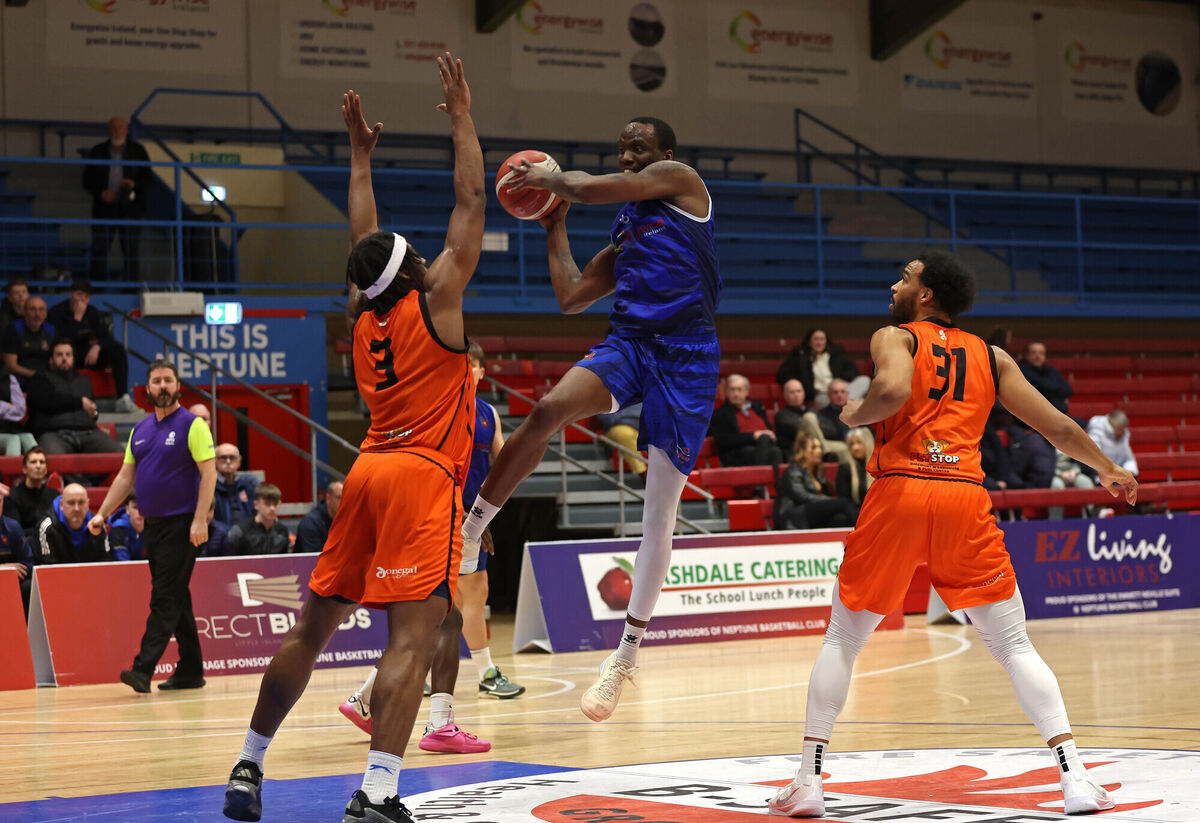 Tamyrik Fields, Energywise Neptune, battling Jevonnie Scott and Rob Montgomery, Sligo All Stars. Picture: Jim Coughlan.