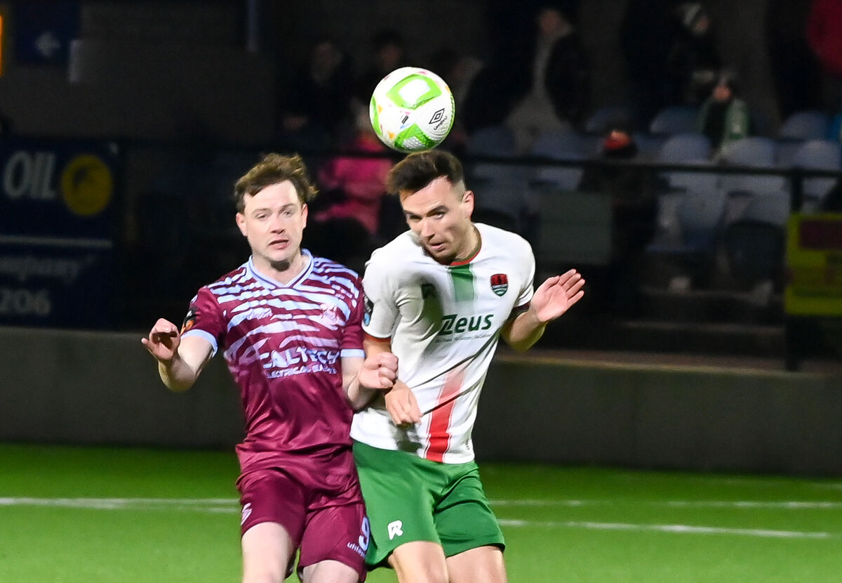  Cork City's Charlie Lyons heads clear under pressure from Cobh Ramblers' Cian Murphy. Picture: David Keane.