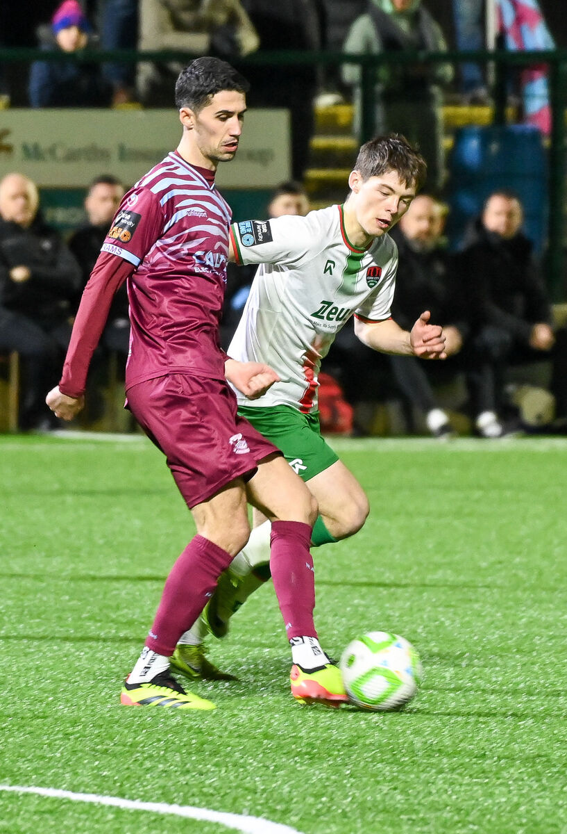  Cobh Ramblers' Shane Griffin gets his pass away as Cork City's Kitt Nelson closes in. Picture: David Keane.