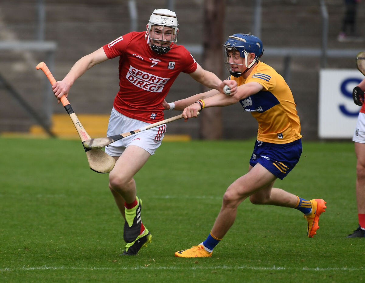 Cork's Matthew Woods holds off Clare's Jack O'Neill in the 2022 Electric Ireland Munster MHC semi-final at Páirc Uí Rinn. Picture: Eddie O'Hare Cork's Matthew Woods holds off Clare's Jack O'Neill in the 2022 Electric Ireland Munster MHC semi-final at Páirc Uí Rinn. Picture: Eddie O'Hare