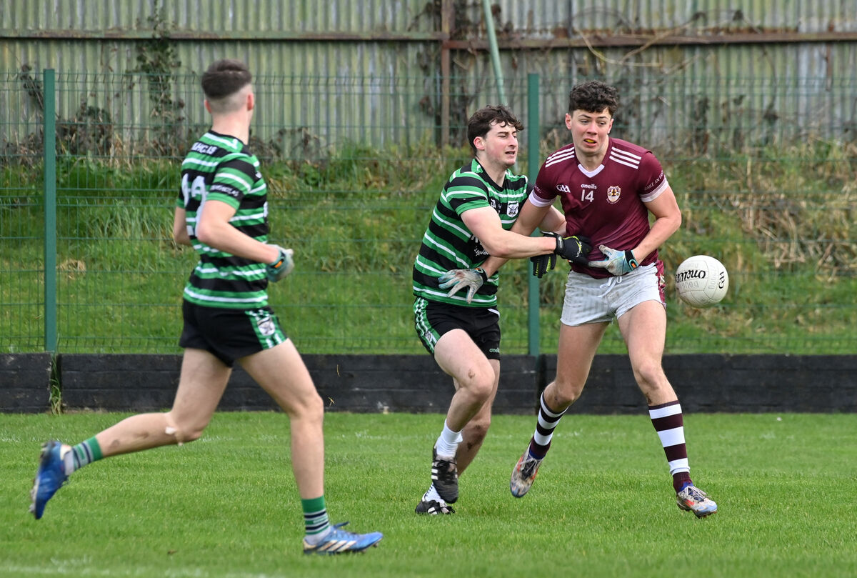  James O'Callaghan Maher, Douglas tackles Conor Dunne, Bishopstown in the PharmaCare City Division U21 A football championship semi-final at Ballinlough, Cork. Picture: Dan Linehan
