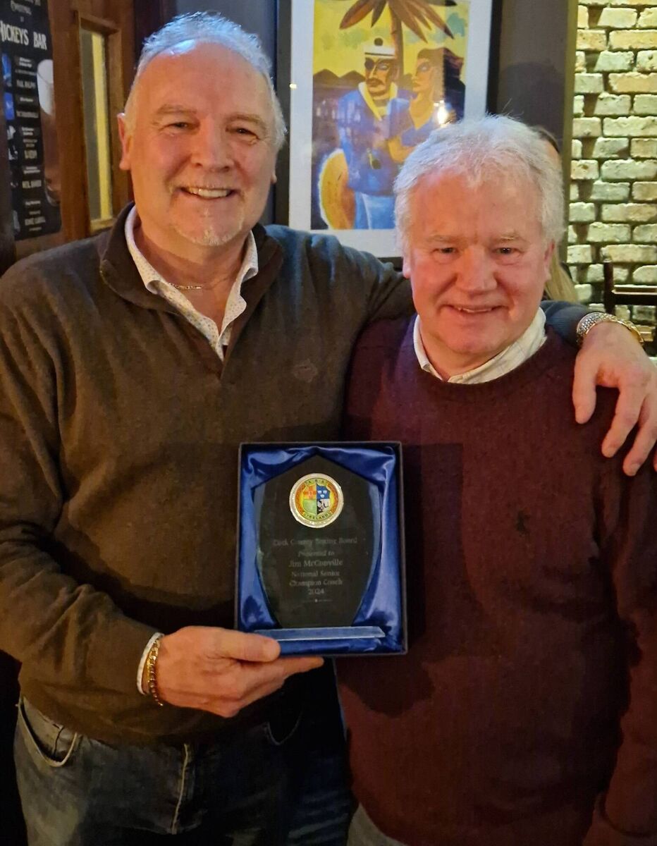 Cork Boxing: Conal Thomas presents Jim McConville, Kanturk Boxing Club, with his award in recognition of his achievements in training Katie O'Keeffe. Cork Boxing: Conal Thomas presents Jim McConville, Kanturk Boxing Club, with his award in recognition of his achievements in training Katie O'Keeffe.