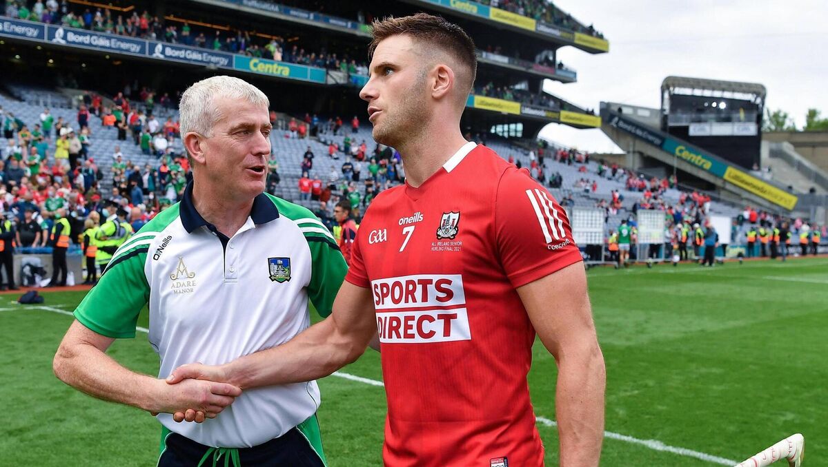 Limerick manager John Kiely with Eoin Cadogan of Cork after the 2021 All-Ireland final. Picture: Ray McManus/Sportsfile