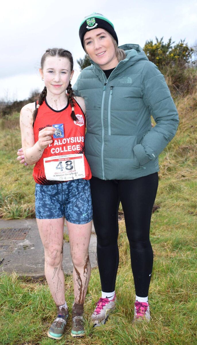 Chloe McCarthy, St Aloysius, Carrigtwohill, winner of the minor girls race at the Munster Schools C-C, pictured with her mother Kate. Picture: John Walshe Chloe McCarthy, St Aloysius, Carrigtwohill, winner of the minor girls race at the Munster Schools C-C, pictured with her mother Kate. Picture: John Walshe