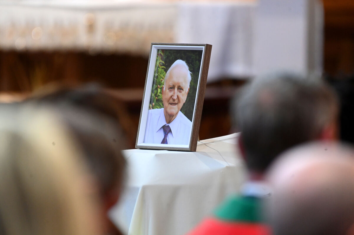 Photo of a smiling Danny Wallace placed on his coffin at the funeral of former lord mayor, TD and Minister of State, Dan Wallace at the Church of the Resurrection, Farranree, Cork. Picture: Larry Cummins Photo of a smiling Danny Wallace placed on his coffin at the funeral of former lord mayor, TD and Minister of State, Dan Wallace at the Church of the Resurrection, Farranree, Cork. Picture: Larry Cummins
