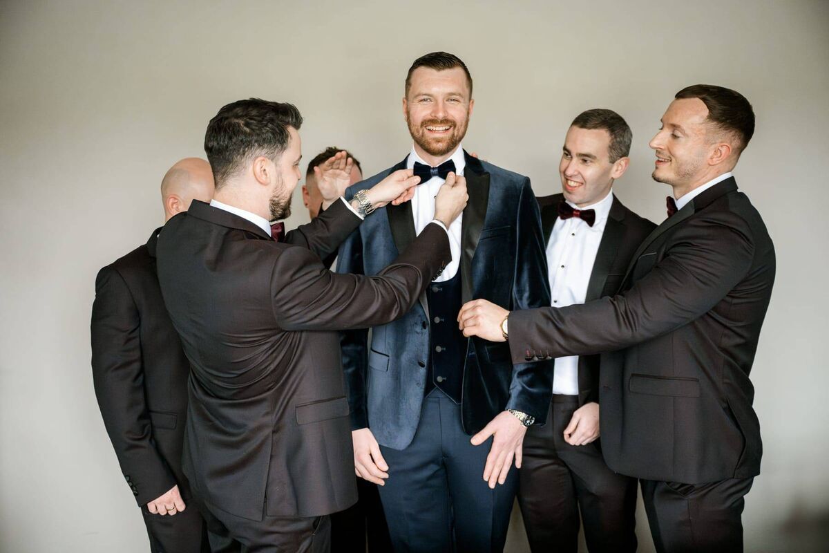 James with his groomsmen. The couple asked their closest friends and family to be part of their bridal party. James with his groomsmen. The couple asked their closest friends and family to be part of their bridal party.