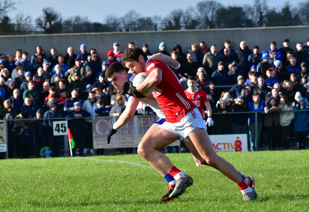  Cork's Paul Walsh tries to move away from Monaghan's Micheál McCarville. Picture: Moya Nolan