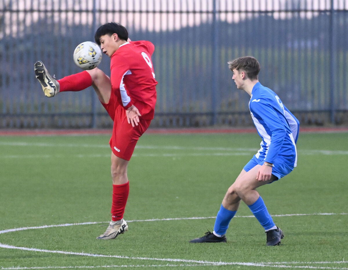Cork Youth league's Rollie Durango knocks the ball away from Limericks Desmond league's Ryan Aylmer during the FAI Youth Inter league cup at Mayfield. Picture: Eddie O'Hare