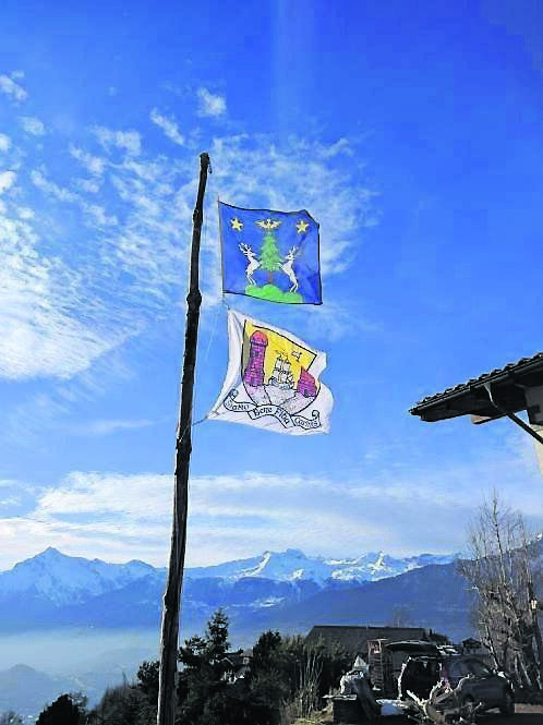 A Cork flag flying over Therese Byrne’s home, alongside a flag for Naz, the region where she lives