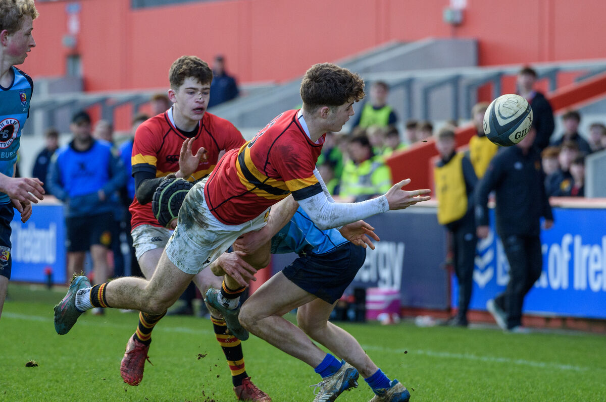 Rossa Kinirons, CBC, Cork getting his pass away as his tackled by Rory O'Dwyer, Castletroy College in the Pinergy Munster Schools Junior Cup quarter-final at Thomond Park, Limerick. Picture Dan Linehan Rossa Kinirons, CBC, Cork getting his pass away as his tackled by Rory O'Dwyer, Castletroy College in the Pinergy Munster Schools Junior Cup quarter-final at Thomond Park, Limerick. Picture Dan Linehan
