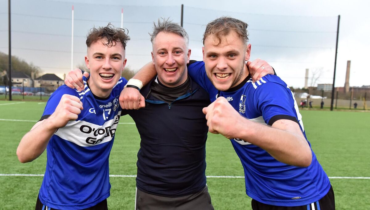 Sarsfields' manager Ray Ryan with Daniel Hogan and Ben Graham celebrate after defeating Midleton in the Cork U21 premier 1 HC final at Pairc Ui Chaoimh