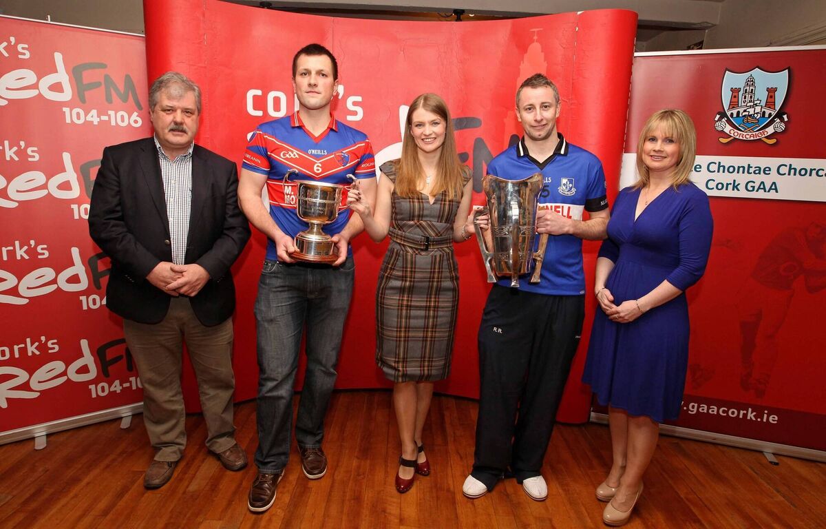 Pictured at the Launch of the RedFM Senior Hurling League 2013, Bob Ryan, Chairman Cork County Board, Eoghan Murphy, Erins Own with the RedFM League Cup, Fiona Darcy, RedFm CEO, Ray Ryan, Sarfields with the Senior Hurling County Championship Cup and Tracey Kennedy, PRO Cork County Board, at the Sarsfields Gaa Pavilion, Riverstown, Co. Cork. /Picture: Jim Coughlan.