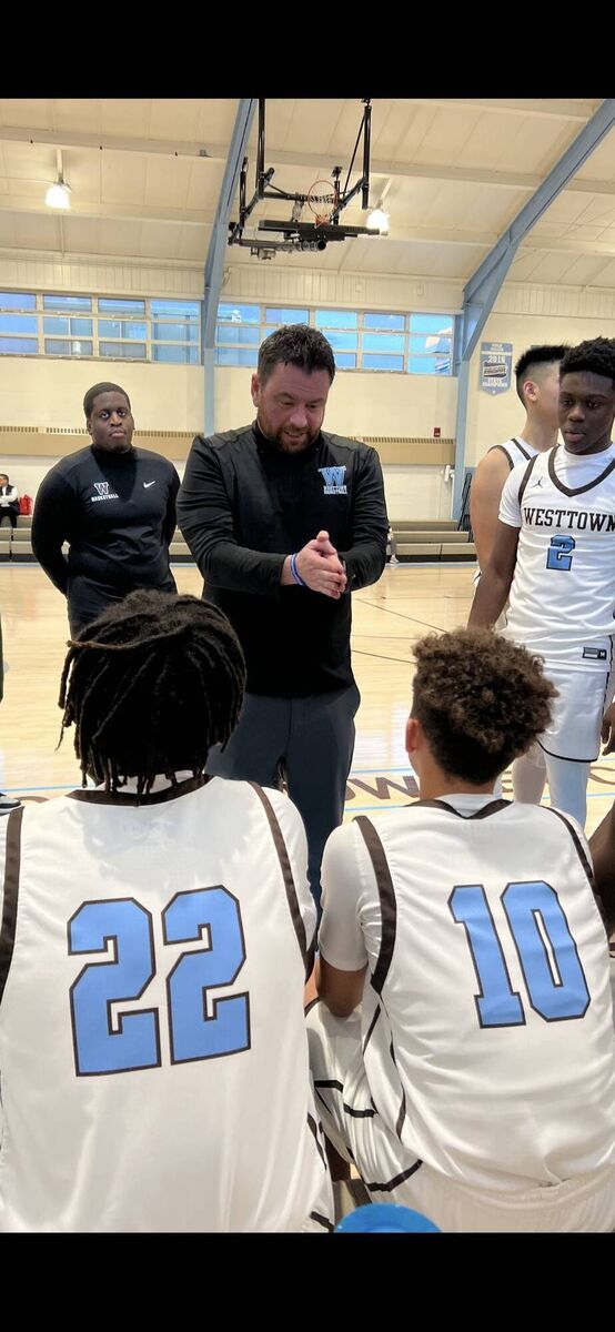 Coach Paul Manning give some instructions to his team Westtown recently. KD 
