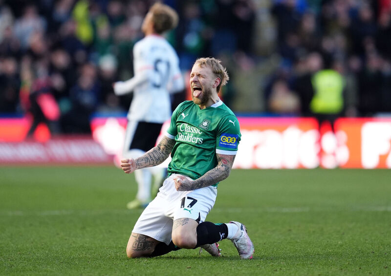 Plymouth Argyle's Tymoteusz Puchacz celebrates their FA Cup fourth round match win over Liverpool at at Home Park, Plymouth. Picture: Adam Davy/PA Wire Plymouth Argyle's Tymoteusz Puchacz celebrates their FA Cup fourth round match win over Liverpool at at Home Park, Plymouth. Picture: Adam Davy/PA Wire