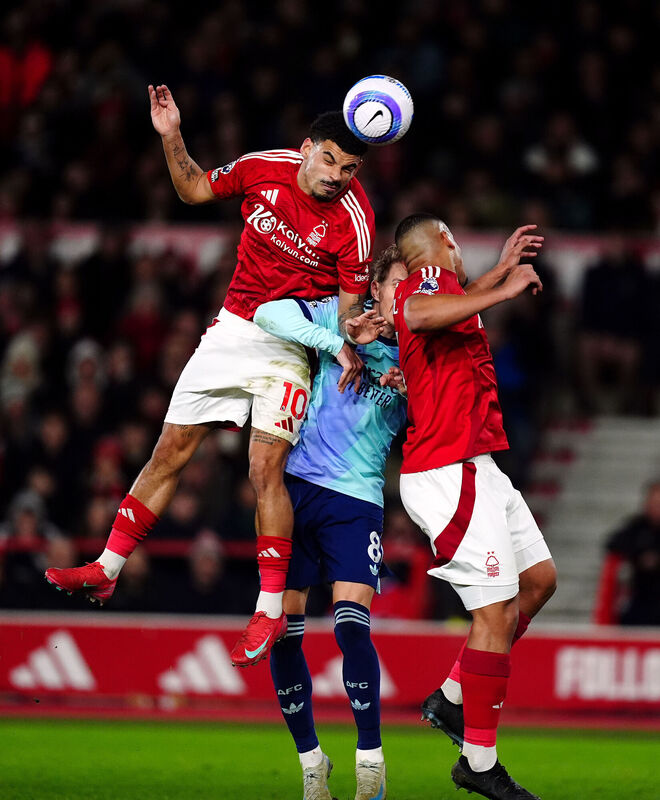 Arsenal's Martin Odegaard is crowded out by Nottingham Forest's Morgan Gibbs-White (left) and Murillo (right) during the Premier League match at the City Ground, Nottingham. Picture: Mike Egerton/PA Wire Arsenal's Martin Odegaard is crowded out by Nottingham Forest's Morgan Gibbs-White (left) and Murillo (right) during the Premier League match at the City Ground, Nottingham. Picture: Mike Egerton/PA Wire