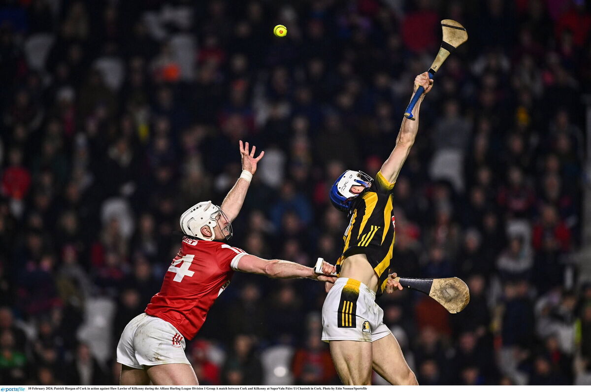 Patrick Horgan of Cork and Kilkenny's Huw Lawlor contest an aerial ball. Picture: Eóin Noonan/Sportsfile