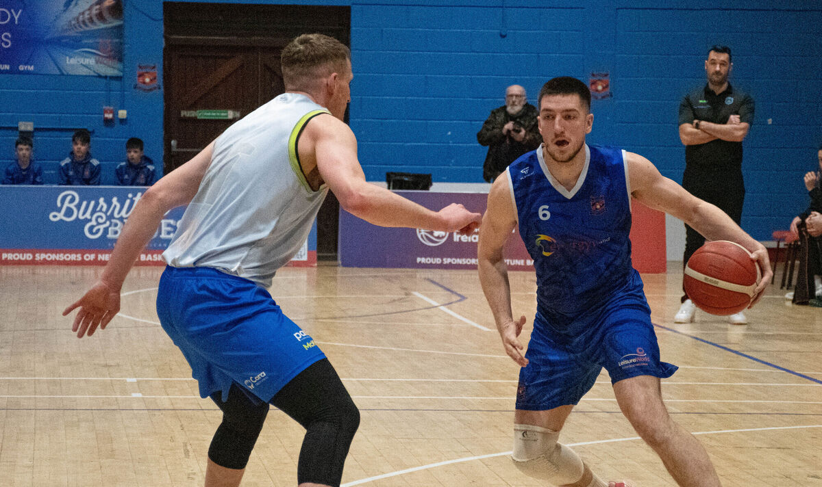 Energywise Ireland Neptune's Cian Heaphy takes on Tralee Warriors' Daniel Jokubaitis. Picture: Howard Crowdy
