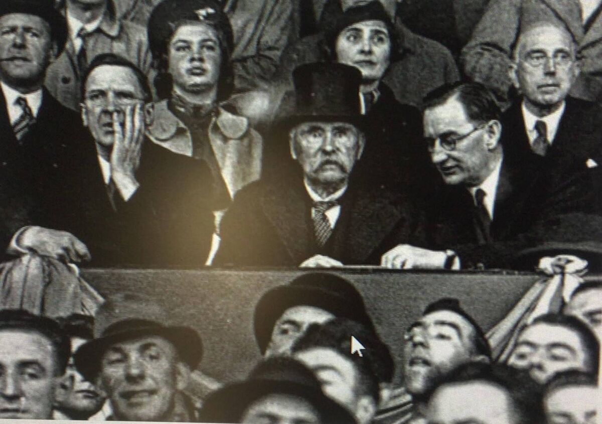  Douglas Hyde, Ireland’s first president, centre, with Éamon de Valera, left, later the third president, and Oscar Traynor, right, watching Ireland play Poland in soccer at Dalymount Park in 1938.