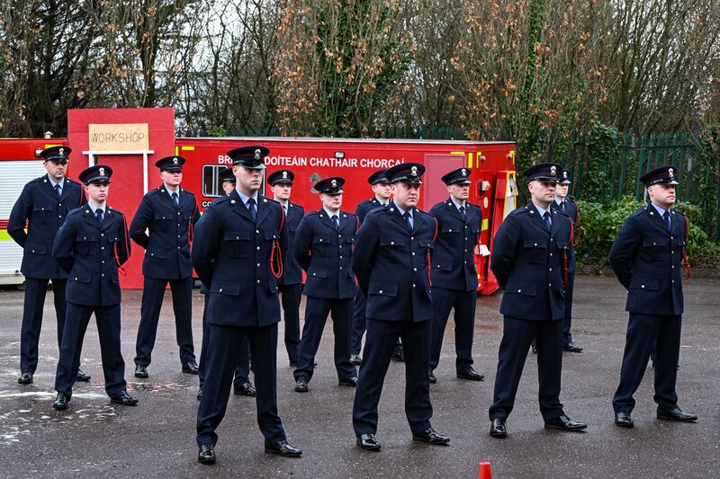 Cork’s newest firefighters stand proudly to attention during their passing out ceremony in Ballincollig Fire Station. Picture Chani Anderson