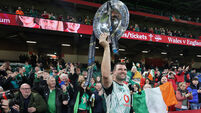 Ireland's Tadhg Beirne  after the match with the Triple Crown Trophy 22/2/2025