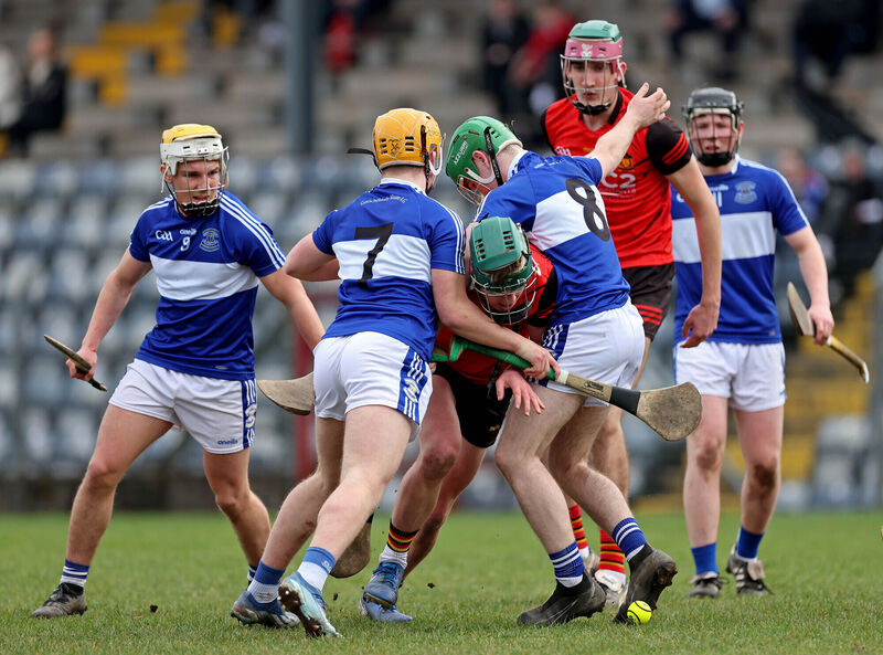 Jamie Ó hÉigeartaigh and Trevor Ó Bruadau of Gaelcholáiste Mhuire battling against Michael Quill of CBC. Picture: Jim Coughlan Jamie Ó hÉigeartaigh and Trevor Ó Bruadau of Gaelcholáiste Mhuire battling against Michael Quill of CBC. Picture: Jim Coughlan