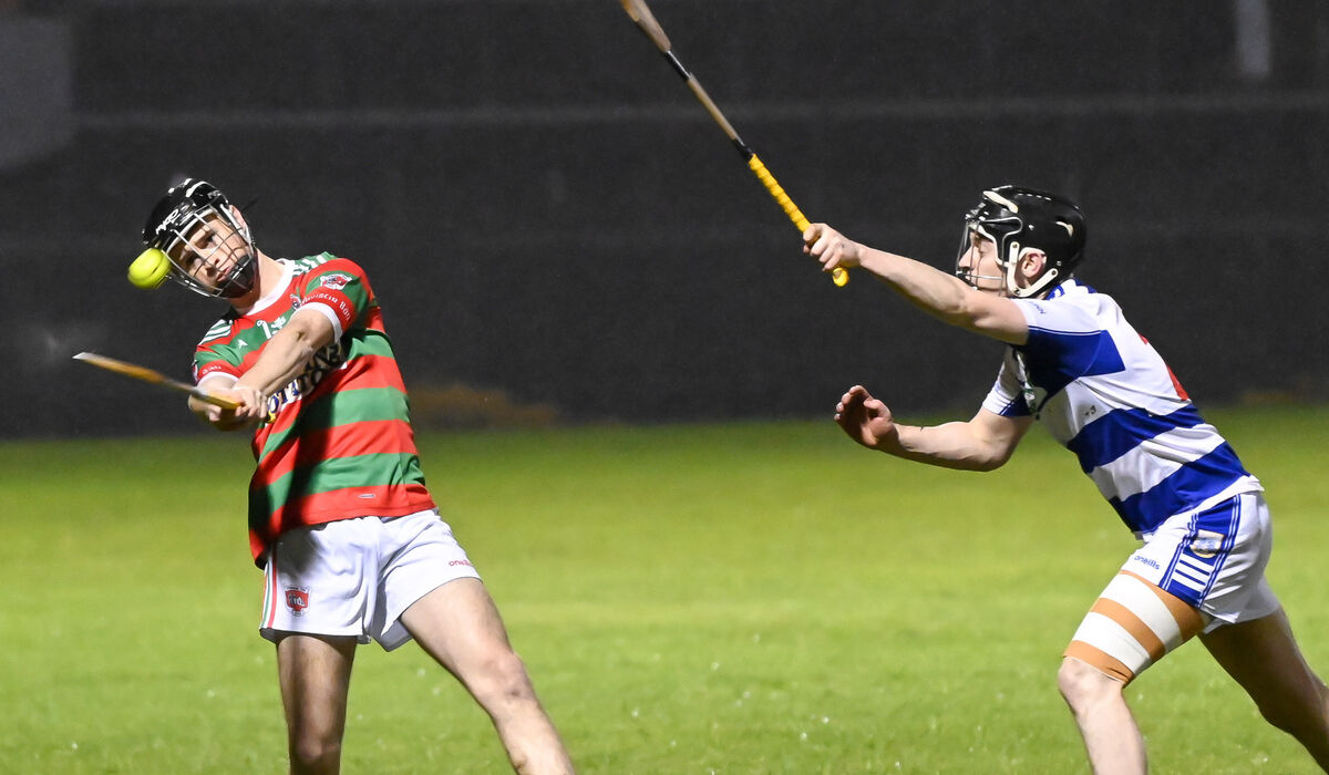 Tracton's Mark Byrne scores a point as Killavullen's Fionn Magner closes in during their County JAHC final last year. Picture: David Keane Tracton's Mark Byrne scores a point as Killavullen's Fionn Magner closes in during their County JAHC final last year. Picture: David Keane