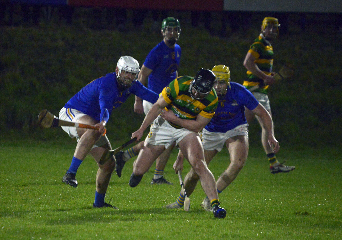 Glen Rovers' Rhys Dunne holds off the challenges of St Finbarr's Colm Keane and Cathal Crowley. Picture: Denis Boyle.