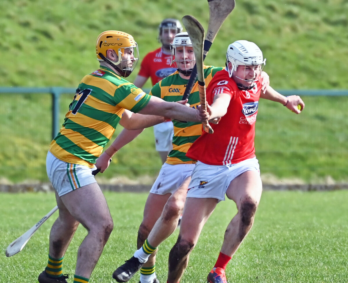 Charleville's Cathal O'Carroll breaks from Blackrock's Niall Cashman and Kevin O'Keeffe during the RedFM HL division 1 game at Charleville. Picture: Eddie O'Hare