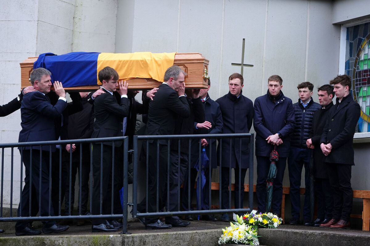 The coffin of Michael O'Sullivan is carried into St John the Baptist Church in Glantane. Picture: Brian Lawless/PA Wire The coffin of Michael O'Sullivan is carried into St John the Baptist Church in Glantane. Picture: Brian Lawless/PA Wire
