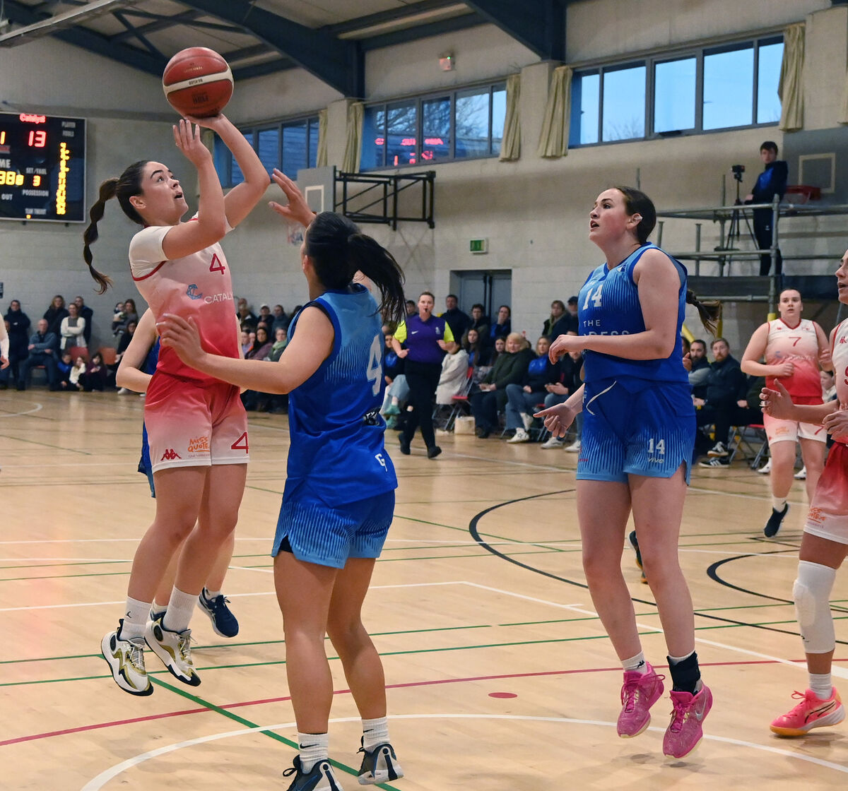 Catalyst Fr Mathews' Lesley Ann Wilkinson shoots from The Address UCC Glanmire's Aine McKenna and Lucy Walsh. Picture: Eddie O'Hare