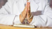 Close up of boy praying