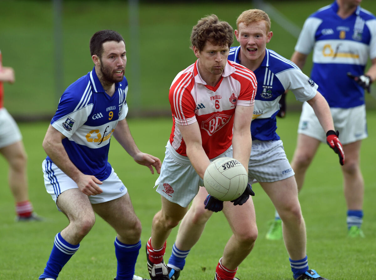 Blarney's Joe Jordan gets the ball away from Clondrohid's Brian Corcoran and Jeremy O'Sullivan during the Mid-Cork JAFC at Coachford in 2015. Picture: Eddie O'Hare