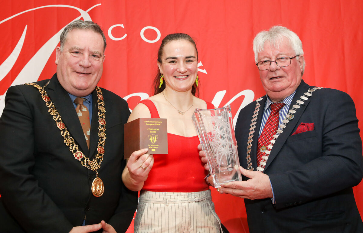 Lord Mayor of Cork Cllr Dan Boyle and Mayor of the County of Cork Cllr Joe Carroll present Olympic Gold medalist Kellie Harrington with her Cork Passport and award as the Honorary Cork Person of the year at the Cork Person of the Year awards which took place at the Cork International Hotel. Picture: David Creedon Lord Mayor of Cork Cllr Dan Boyle and Mayor of the County of Cork Cllr Joe Carroll present Olympic Gold medalist Kellie Harrington with her Cork Passport and award as the Honorary Cork Person of the year at the Cork Person of the Year awards which took place at the Cork International Hotel. Picture: David Creedon