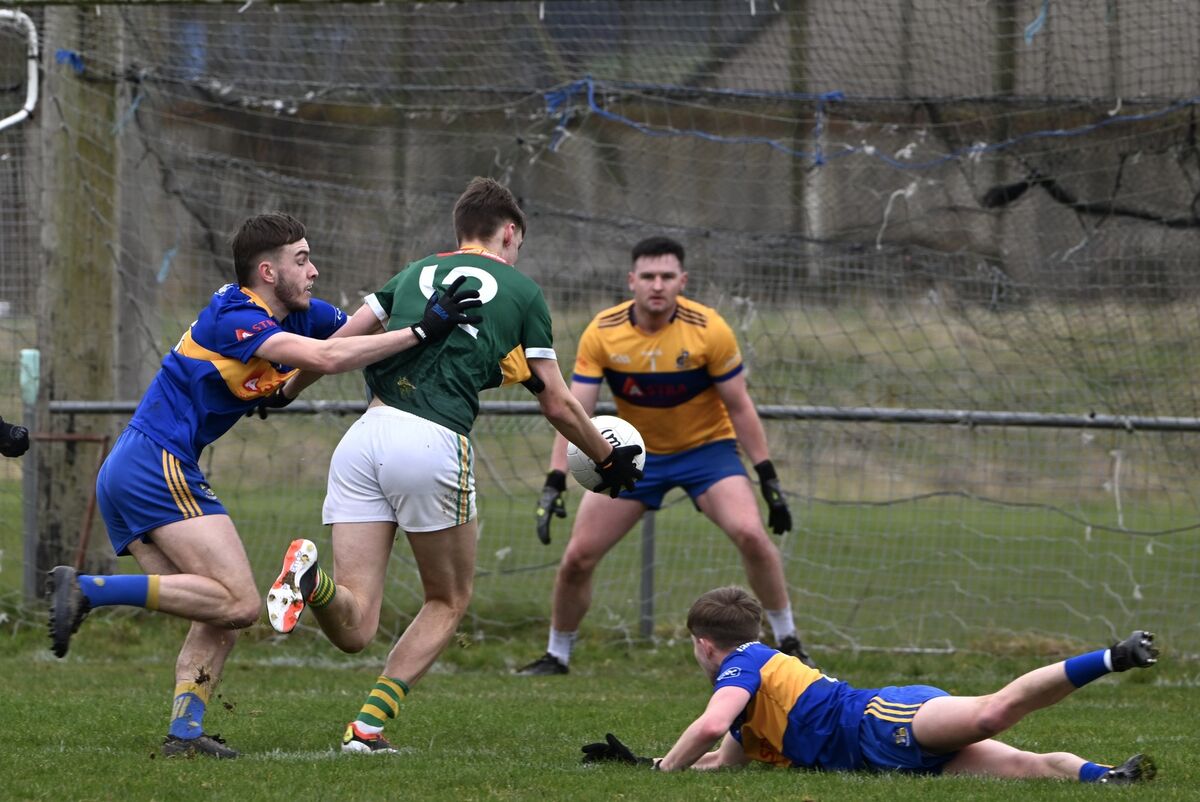 Carrigaline’s Callum Dungan is poised and ready as St Michael's Kyle Leahy attempts to shoot for a goal this season. Picture: Chani Anderson