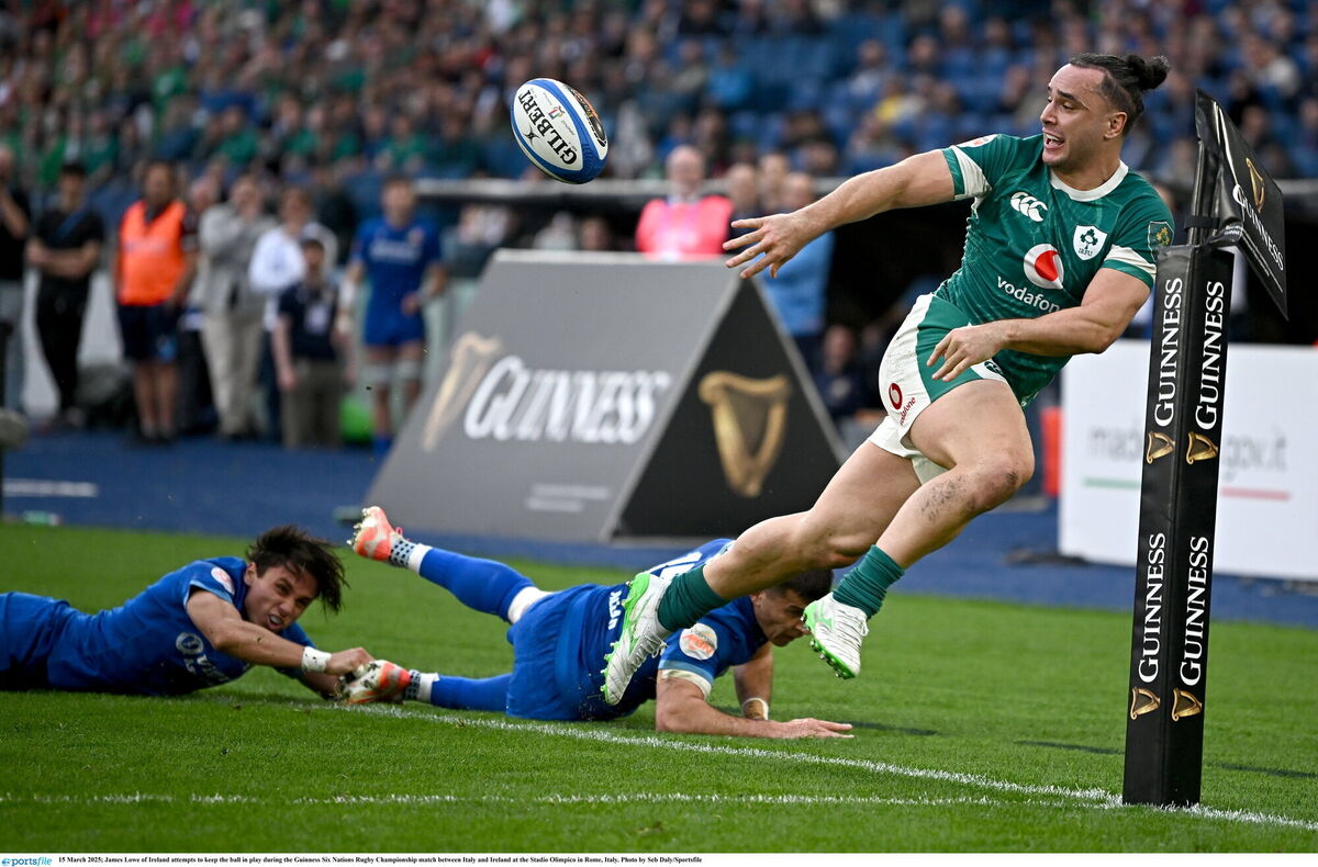 James Lowe of Ireland attempts to keep the ball in play. Picture: Seb Daly/Sportsfile