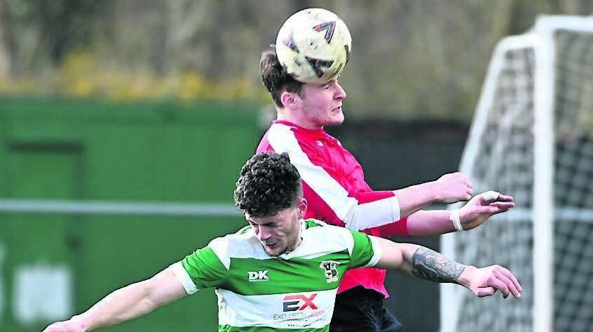 Bandon’s Coen Crowley gets above Ballincollig’s Stephen Murray. Picture: Eddie O’Hare
Bandon’s Coen Crowley gets above Ballincollig’s Stephen Murray. Picture: Eddie O’Hare